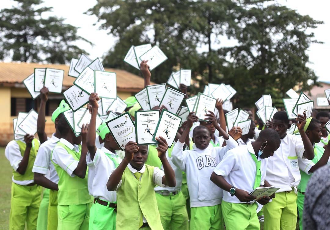 Young players holding competition certificates